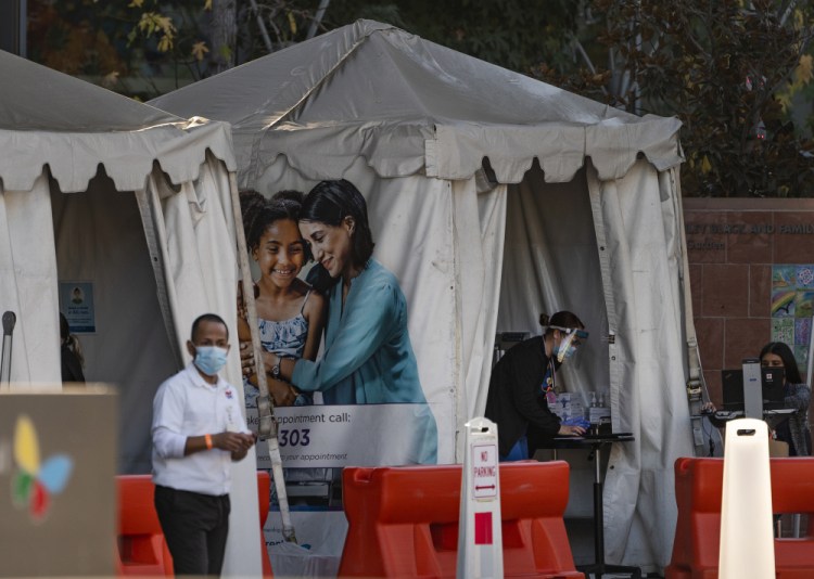 Medical tents for vaccinations are set outside the Children's Hospital Los Angeles Friday, Dec. 18. Increasingly desperate California hospitals are being "crushed" by soaring coronavirus infections, with one Los Angeles emergency doctor predicting, that rationing of care is imminent. 