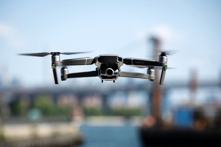 A SZ DJI Technology Co. Mavic 2 Zoom drone flies over the Brooklyn Navy Yard in the Brooklyn Borough of New York on Aug. 23, 2018.