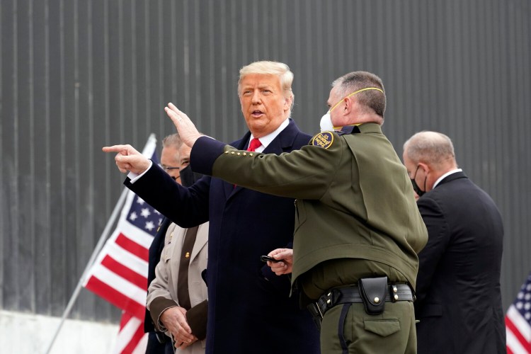 President Donald Trump tours a section of the U.S.-Mexico border wall under construction Tuesday, Jan. 12, 2021, in Alamo, Texas. (AP Photo/Alex Brandon)