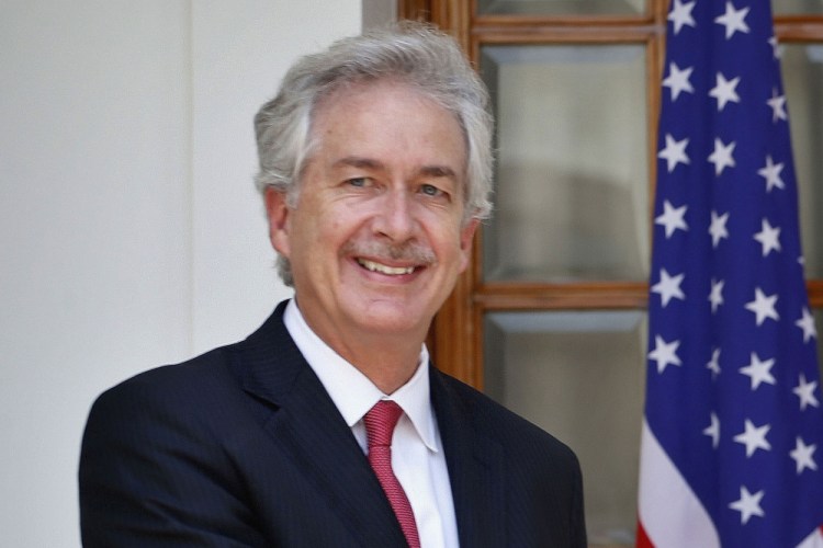 FILE - In this July 10, 2014 file photo, then U.S. Deputy Secretary of State William Burns, is shown in New Delhi, India. President-elect Joe Biden has chosen the veteran diplomat to be his CIA director. 
