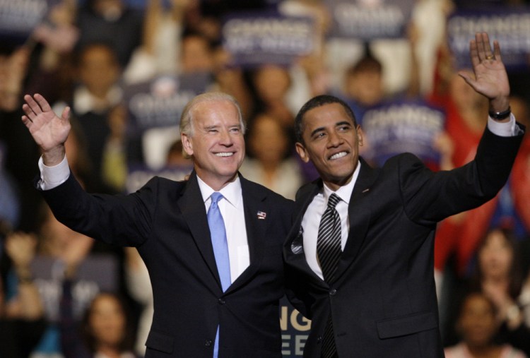 Vice presidential candidate Joe Biden, D-Del., and Democratic presidential candidate Sen. Barack Obama, D-Ill., take part in a rally at the Bank Atlantic Center in Sunrise, Fla., in 2008. 

