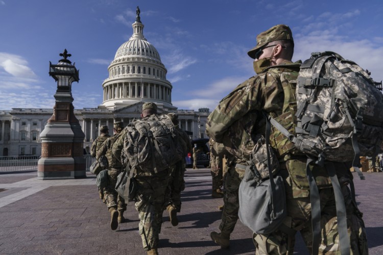 National Guard troops reinforce security around the U.S. Capitol ahead of President-elect Joe Biden's inauguration, in Washington on Sunday,  following the deadly attack on Congress by a mob of supporters of President Trump.