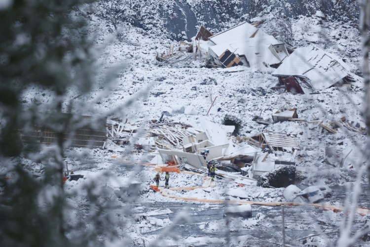 Rescue crews work in the area at Ask in Gjerdrum on Saturday after a massive landslide smashed into a residential area near the Norwegian capital on Wednesday. 
