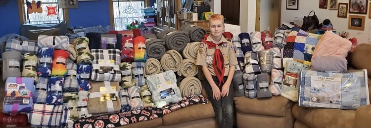 Owen Riddle of Sidney, a member of Boy Scout Troop 428 in Pittsfield, collected a total of 120 blankets to give patrons at his local food pantry.