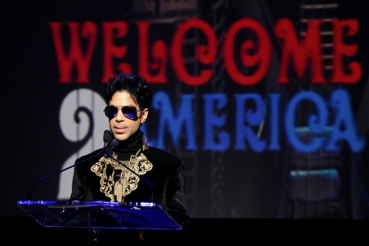 FILE - In this Oct. 14, 2010 file photo, musician Prince holds a news conference at The Apollo Theater announcing his "Welcome 2 America" tour in New York on Oct. 14, 2010. Internal Revenue Service calculations showed that executors of the rock star's estate undervalued it by 50 percent, or about $80 million. 
