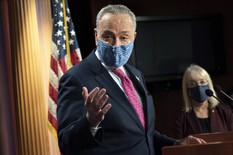 Senate Majority Leader Chuck Schumer of New York speaks during a news conference next to Sen. Patty Murray, D-Wash., on Tuesday on Capitol Hill in Washington. "Time is of the essence to address this crisis. We're keeping all options open on the table,” Schumer said of the coronavirus pandemic. 