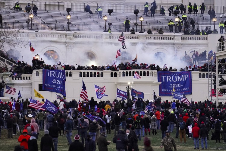 Violent rioters loyal to Donald Trump storm the Capitol on Jan. 6. The words of Trump supporters who are accused of participating in the deadly Capitol riot may end up being used against him in his Senate impeachment trial as he faces the charge of inciting a violent insurrection.  