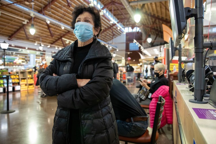 Ramona Cohen, 75, waits in line at a Giant grocery store in Washington, D.C. in the hope of getting a leftover dose of the coronavirus vaccine on Jan. 15, 2021. MUST CREDIT: photo for The Washington Post by Amanda Andrade-Rhoades.