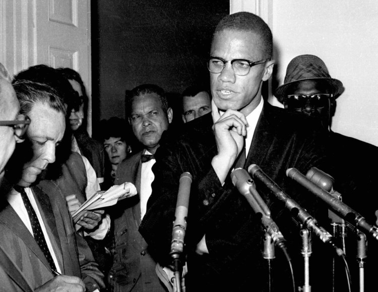 Civil rights leader Malcolm X speaks to reporters in Washington, D.C. on May 16, 1963. Sunday marked the 56th anniversary of his assassination. 