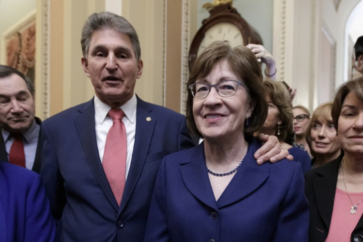Sen. Susan Collins, R-Maine, and Sen. Joe Manchin, D-W.Va., shown in February, are leading informal talks to try to establish a commission to study the Jan. 6 insurrection at the Capitol. 