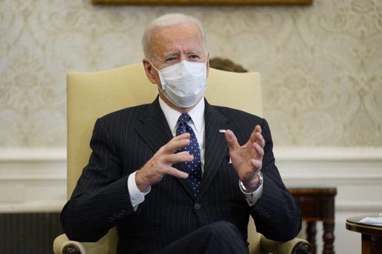 President Biden meets with business leaders to discuss his coronavirus relief package in the Oval Office on Tuesday. 