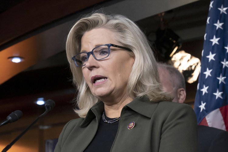 Rep. Liz Cheney, R-Wyo., speaks with reporters at the Capitol in Washington in December 2019. 