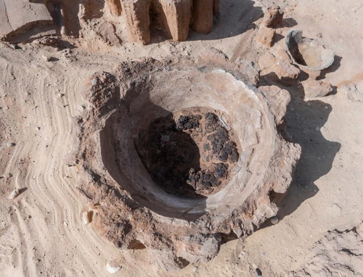 Archaeologists discovered a pottery basin, which they say had been used to heat up a mixture of grains and water to produce beer, in Abydos, some 280 miles south of Cairo, Egypt. 