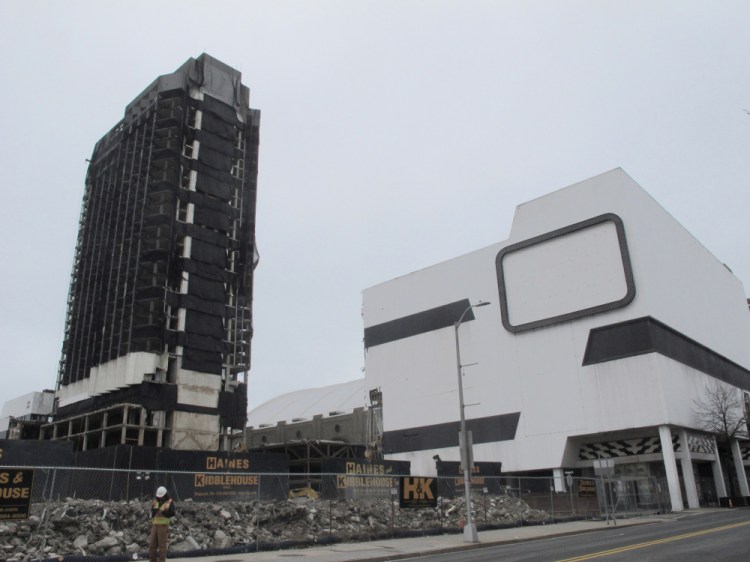 The former Trump Plaza casino in Atlantic City, N.J. on Tuesday, the day before its main tower, left, was to be imploded. 