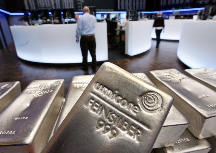 Silver futures jumped almost 12 percent on Monday to over $30 per ounce, overwhelming coin dealers. 