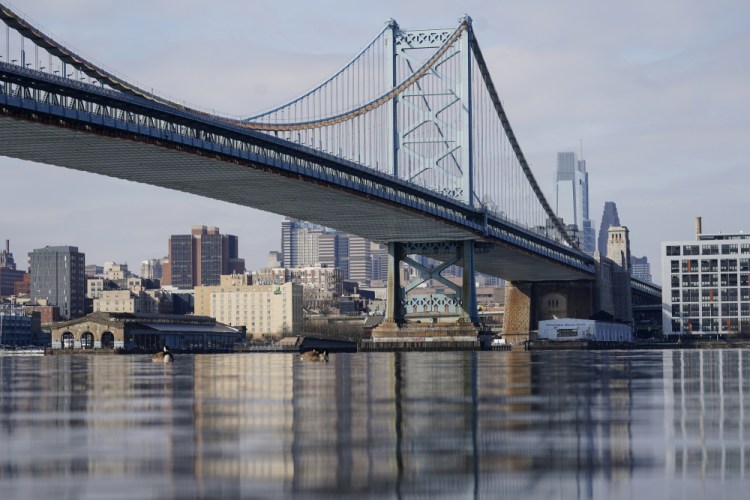 The Philadelphia side of the Benjamin Franklin Bridge spanning the Delaware River on Feb. 10. The Delaware River Basin Commission voted Thursday to permanently ban natural gas drilling and fracking because it poses too great of a risk to the the river and its tributaries that supply drinking water to Philadelphia and half the population of New York City.