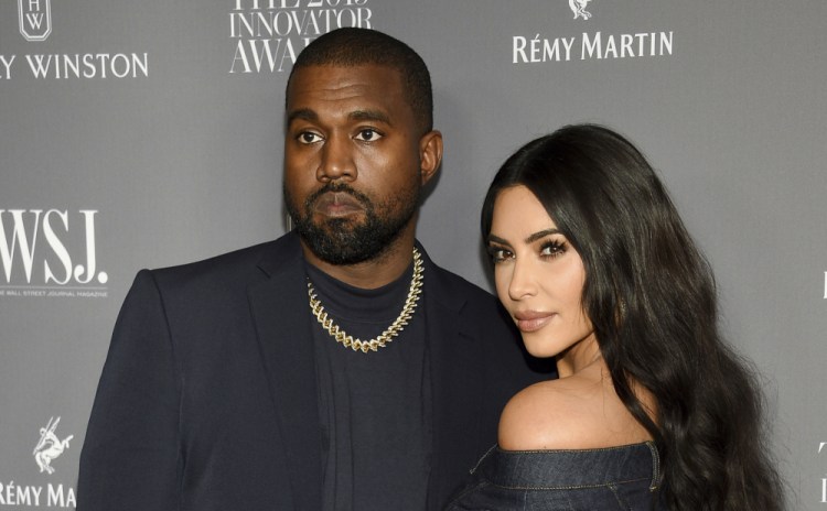 Kanye West and Kim Kardashian, shown in 2019, are splitting. 