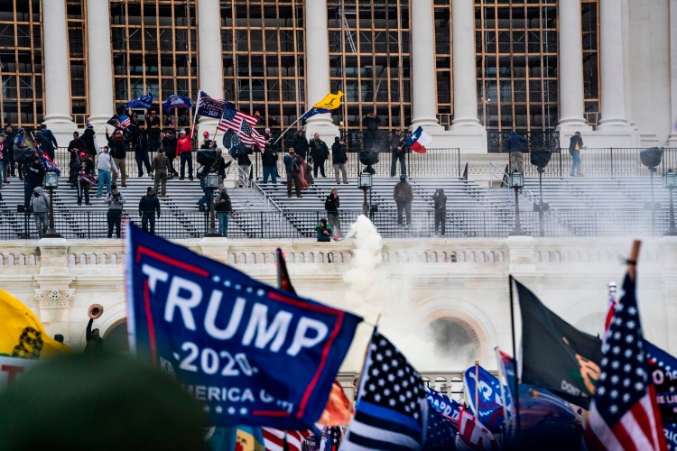 Supporters of President Donald Trump clash with the U.S. Capitol police during a riot at the U.S. Capitol on Jan. 6, 2021, in Washington, D.C. (Alex Edelman/AFP via Getty Images/TNS)