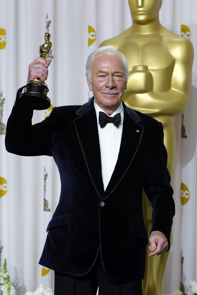 Christopher Plummer poses with the Oscar for best supporting actor for his work in "Beginners" during the 84th Academy Awards in 2012. (AP Photo/Joel Ryan, File)