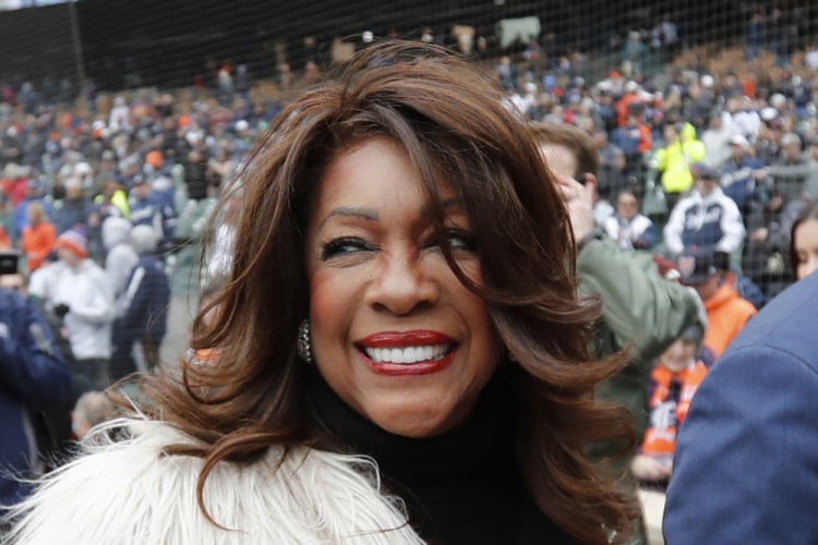 In this April 4, 2019, file photo, Mary Wilson, one of the original members of The Supremes, is escorted after singing the national anthem before a baseball game between the Detroit Tigers and the Kansas City Royals in Detroit. Wilson died in Las Vegas, publicist Jay Schwartz told KABC-TV. She was 76. 