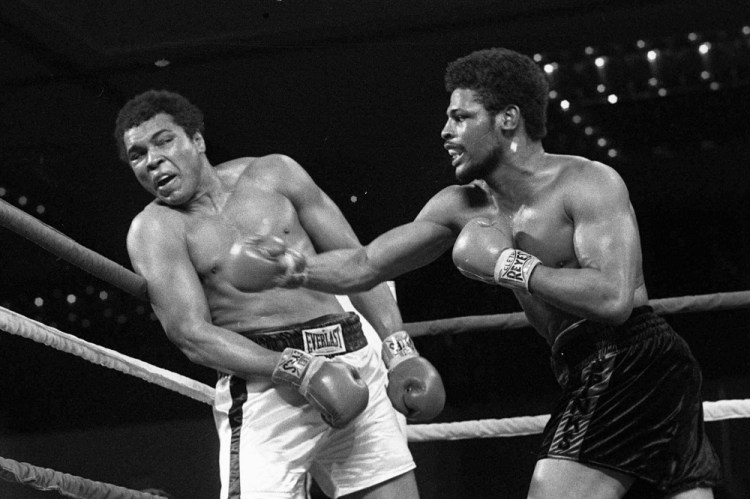 Leon Spinks, right, connects with a right hook to Muhammad Ali, during the late rounds of their championship fight in Las Vegas in 1978. 