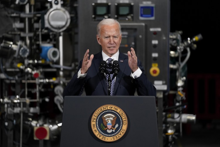 President Biden speaks after a tour of a Pfizer manufacturing site Friday in Portage, Mich.