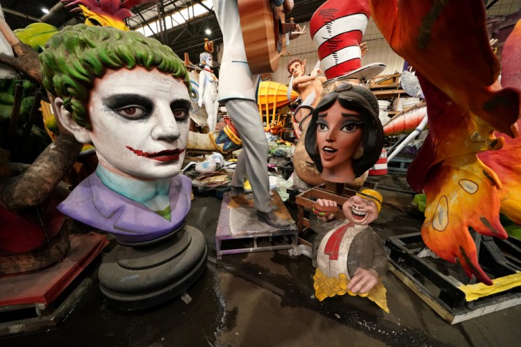 Parts of Mardi Gras floats created by Kern Studios sit stored inside Mardi Gras World in New Orleans, Friday. New Orleans' annual pre-Lenten Mardi Gras celebration is muted this year because of the coronavirus pandemic.
