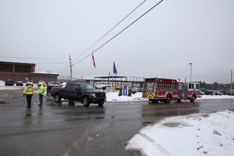 Emergency crews gather outside the Maine Correctional Center in Windham on Friday.