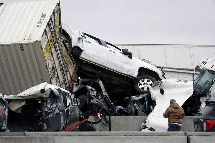 Vehicles are piled up after a fatal crash on Interstate 35 near Fort Worth, Texas, on Thursday.  