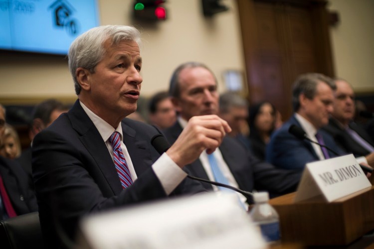 Jamie Dimon, chair and CEO of JP Morgan Chase, shown in 2019, and other CEOs are expected to meet with President Biden at the White House on Tuesday to discuss the administration's economic relief package. 