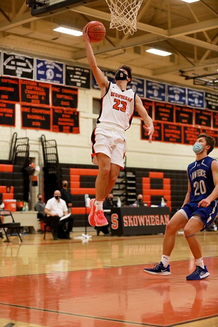 Skowhegan's Jimmy Reed goes up for a layup during a game against Lawrence on Friday night in Skowhegan.
