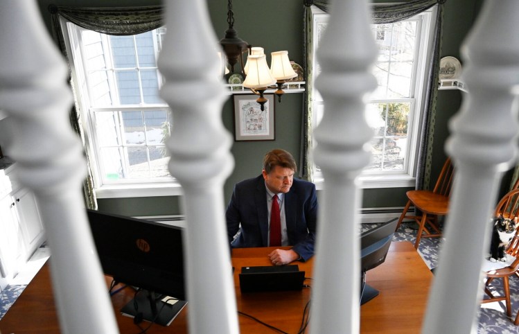 SACO, ME - MARCH 6: CPA Eric Purvis works on taxes from his home in Saco Tuesday, March 9, 2021. Purvis is a CPA dealing with uncertainty surrounding the federal American Recovery Act and state treatment of PPP loan forgiveness, so tax season is not as smooth as it could be this spring. (Staff Photo by Shawn Patrick Ouellette/Staff Photographer)