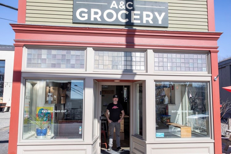 PORTLAND, ME - MARCH 21: Owner of A&C Grocery Joe Fournier on Tuesday, March 30, 2021. Fournier partners with a local company CarHop, for delivery services, but the top hit in a Google search for A&C Grocery is a Grubhub ad. (Staff photo by Brianna Soukup/Staff Photographer)