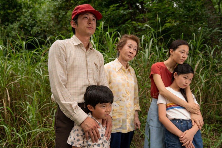 This image released by A24 shows, from left, Steven Yeun, Alan S. Kim, Yuh-Jung Youn, Yeri Han, and Noel Cho in a scene from "Minari."