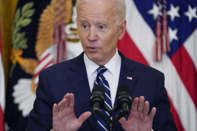 President Biden, shown Thursday, said of Georgia's new voting law on Friday, “This law, like so many others being pursued by Republicans in statehouses across the country, is a blatant attack on the Constitution and good conscience.” 