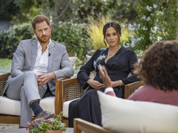 Prince Harry, left, and Meghan, Duchess of Sussex, in conversation with Oprah Winfrey.