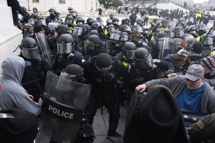U.S. Capitol Police push back rioters trying to enter the U.S. Capitol in Washington on Jan. 6. 