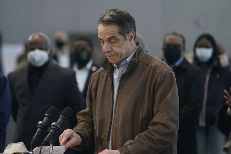 New York Gov. Andrew Cuomo speaks at a vaccination site on Monday in New York. A lawyer for Gov. Andrew Cuomo said Thursday that she reported a groping allegation made against him to local police after the woman involved declined to press charges herself.