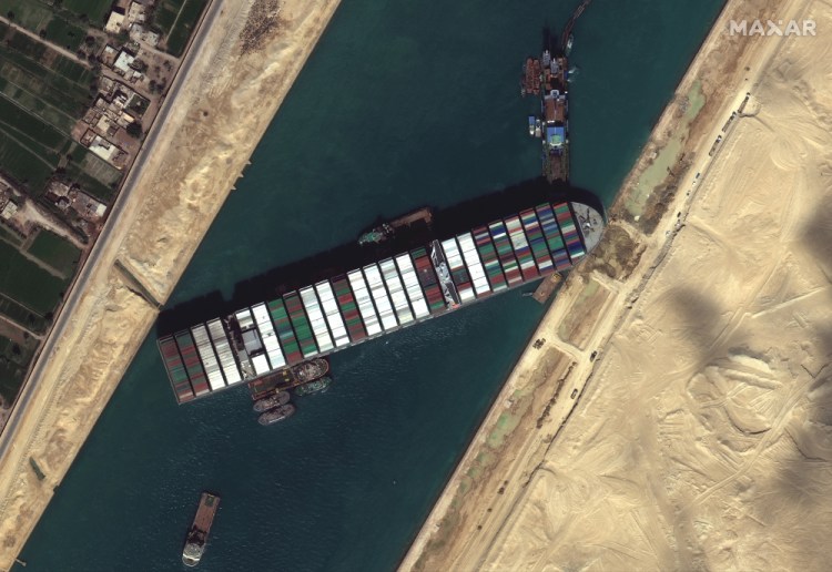 The cargo ship MV Ever Given stuck in the Suez Canal near Suez, Egypt, Saturday.