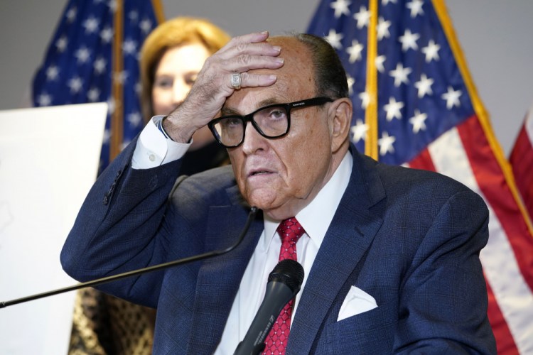 Former New York Mayor Rudy Giuliani, who was a lawyer for President Trump, was central to the then-president's efforts to dig up dirt against Democratic rival Joe Biden and to press Ukraine for an investigation into Biden and his son, Hunter – who himself now faces a criminal tax probe by the Justice Department. 