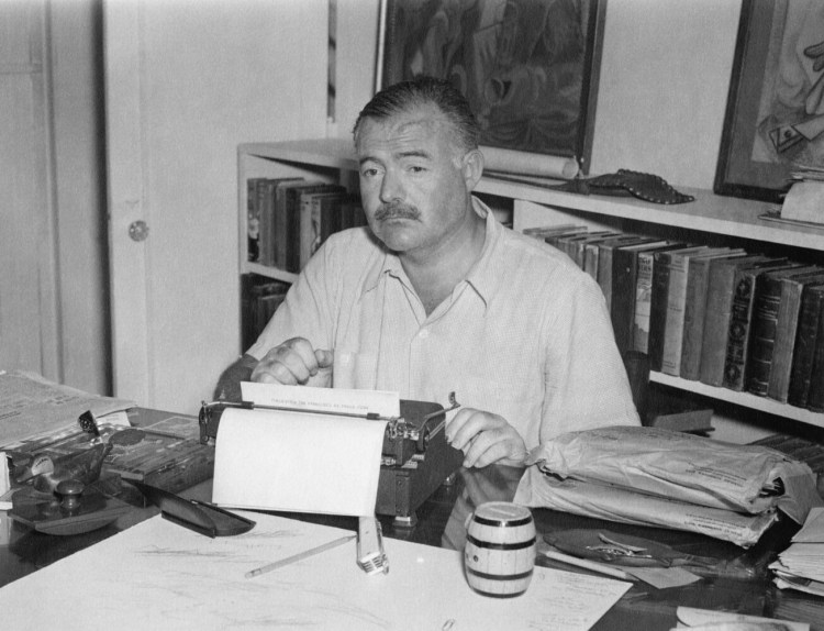 EH5647P           undated

Ernest Hemingway sitting at typewriter, writing on "Finca Vigia, near San Francisco de Paula, Cuba San Francisco de Paula Cuba" stationary, at Finca Vigia, near San Francisco de Paula, Cuba

Please credit: "Photographer unknown. Ernest Hemingway Collection. Photographs. John F. Kennedy Presidential Library and Museum, Boston"