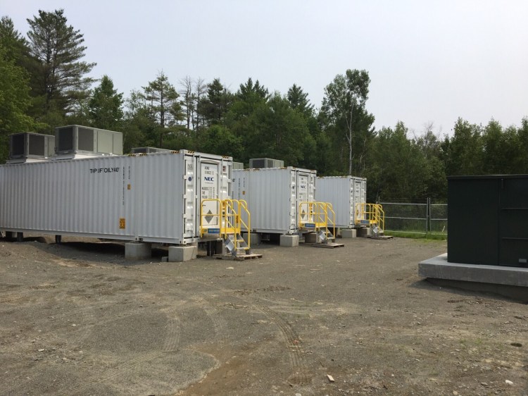 Inside each of three, 53-foot-long metal containers in Madison, 950 lithium-ion batteries are charged and discharged daily to help supply power, provide backup and help balance the operations of the region’s electric grid. This 4.99-megawatt project, built in 2019 by New England Battery Storage, costs roughly $5 million. It's an example of the growing fleet of standalone battery plants being developed in Maine and elsewhere. 
