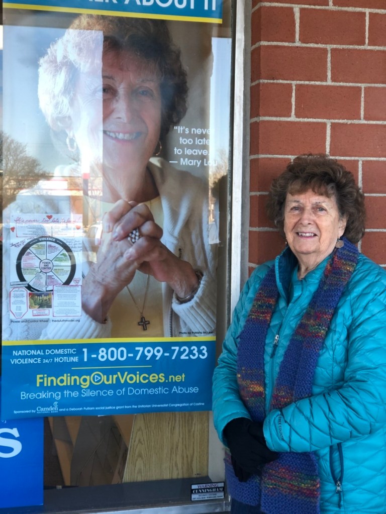 Faces of domestic abuse survivors featured on South Portland storefronts