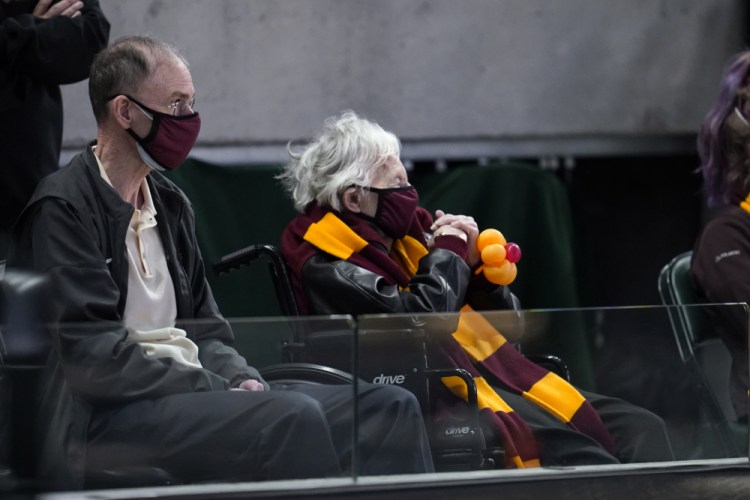 Sister Jean Dolores Schmidt watches Loyola Chicago play Illinois during the first half of a men's college basketball game in the second round of the NCAA tournament at Bankers Life Fieldhouse in Indianapolis, Sunday.