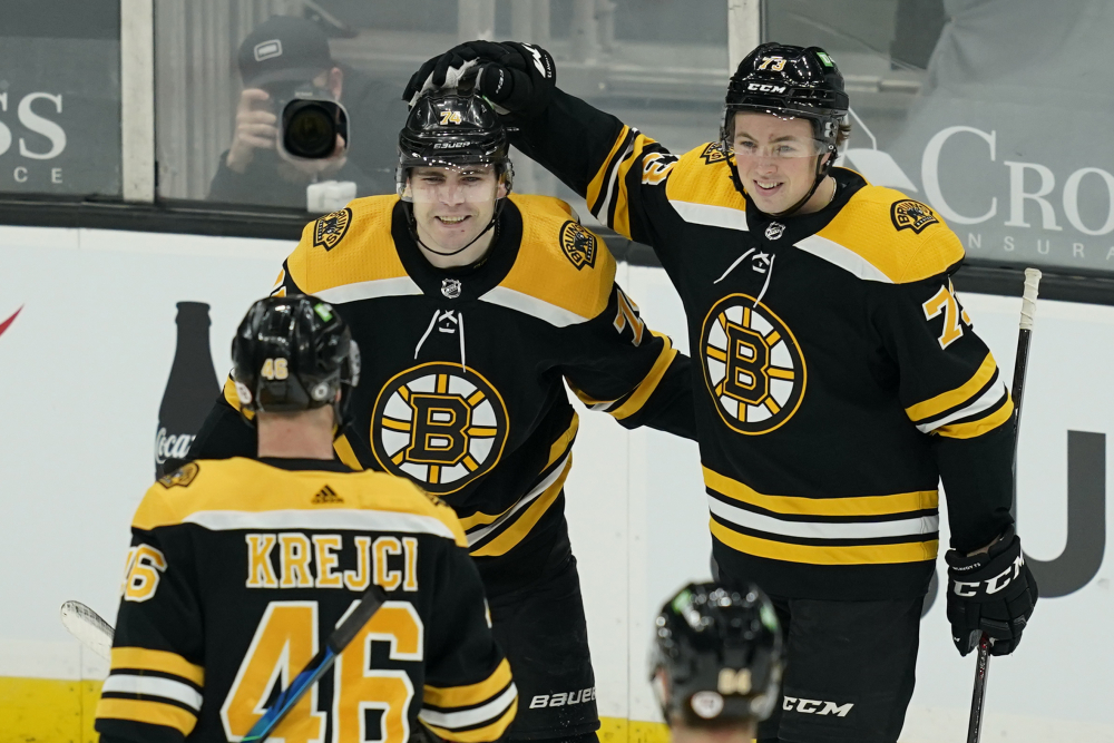 Jake DeBrusk, Charlie McAvoy, David Krejci