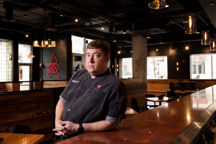 Andrew Darneille, owner and pit master at Smokecraft BBQ, poses at the restaurant in Arlington, Va., in January 2021. MUST CREDIT: Photo for The Washington Post by Deb Lindsey