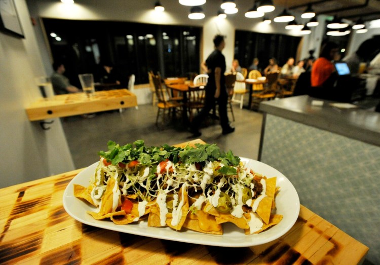 The Korean BBQ Pork Nachos at Foulmouthed Brewing. Do these indicate critic Andrew Ross' not-so-secret love of pork?