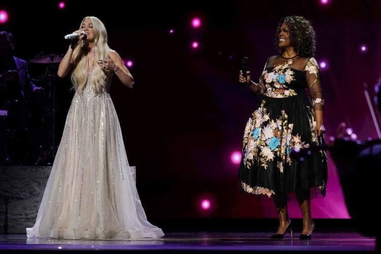 Carrie Underwood, left, and CeCe Winans perform at the 56th annual Academy of Country Music Awards on Saturday at the Grand Ole Opry in Nashville, Tenn. 