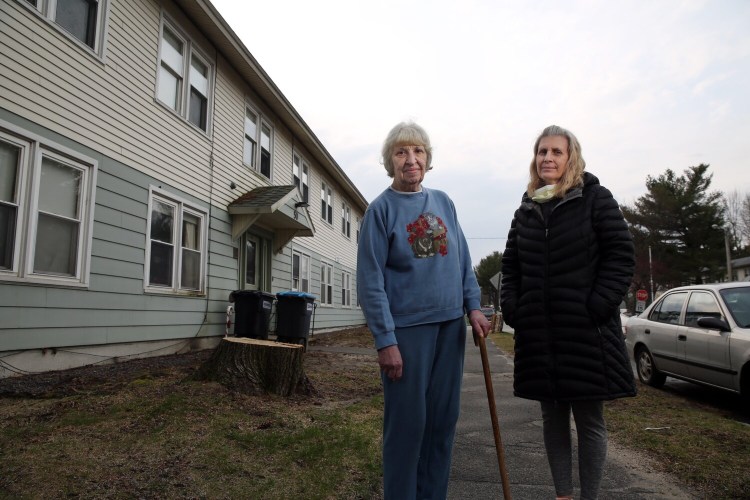 PORTLAND, ME - APRIL 21: Carolyn Silvius, left, and Stephanie Neuts outside Silvius' Portland home. Silvius, an advocate for Homeless Voices for Justice, and Neuts, a founding member of Portlanders for Safer Shelters and a resident of Riverton, are among a group of residents who are pursuing a citizens' referendum to limit the size of new emergency shelters in Portland to 50 people. The proposal is intended to block the city's efforts to create 200-bed homeless services center in Riverton. (Staff photo by Ben McCanna/Staff Photographer)