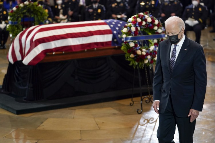President Joe Biden walks from the podium after speaking during a ceremony to honor slain U.S. Capitol Police officer William "Billy" Evans as he lies in honor at the Capitol in Washington, Tuesday, April 13. 